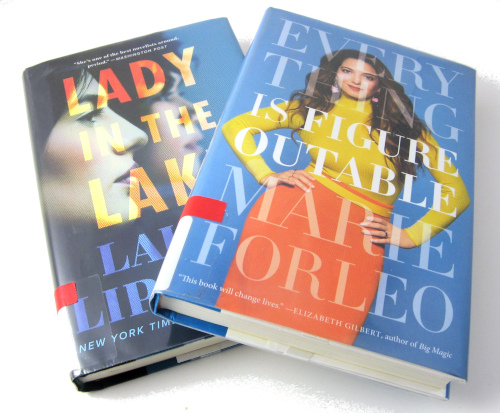Two books with blue, orange, and yellow covers