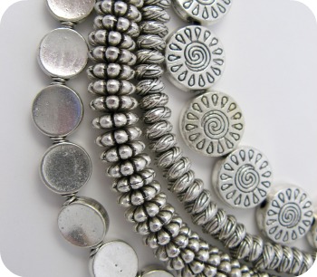 Strands of pewter beads