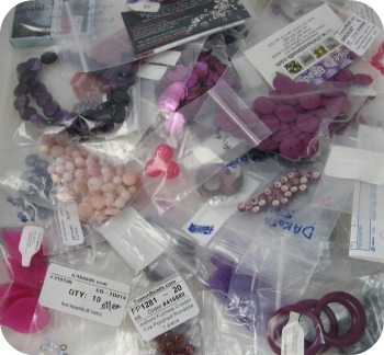 Pile of pink and purple beads
